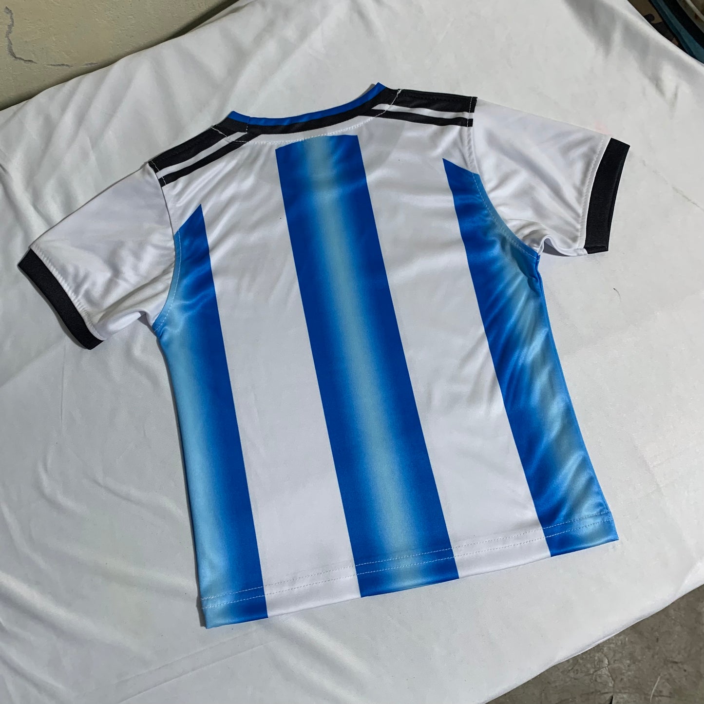 ARGENTINA WORLD CUP 2026 FULL BODY PRINT PREMIUM QUALITY KIDS JERSEY