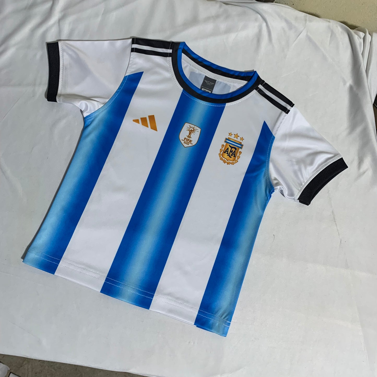 ARGENTINA WORLD CUP 2026 FULL BODY PRINT PREMIUM QUALITY KIDS JERSEY